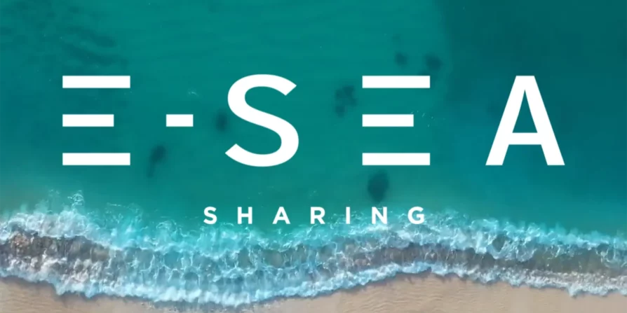L'immagine mostra il logo "E-SEA" con la parola "SHARING" sotto, sovrapposta a una vista aerea dell'oceano, con onde che si infrangono sulla spiaggia